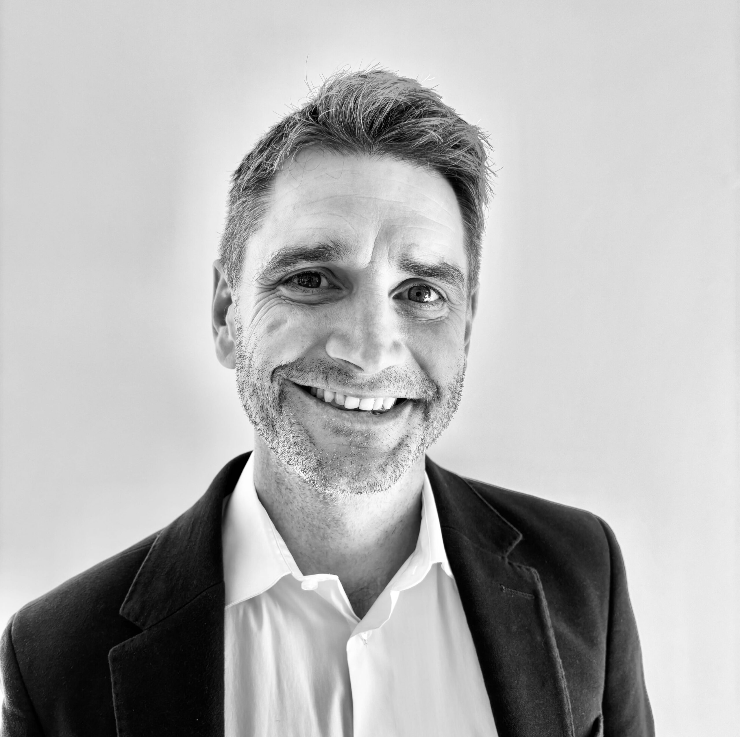 Headshot of James Goodhue